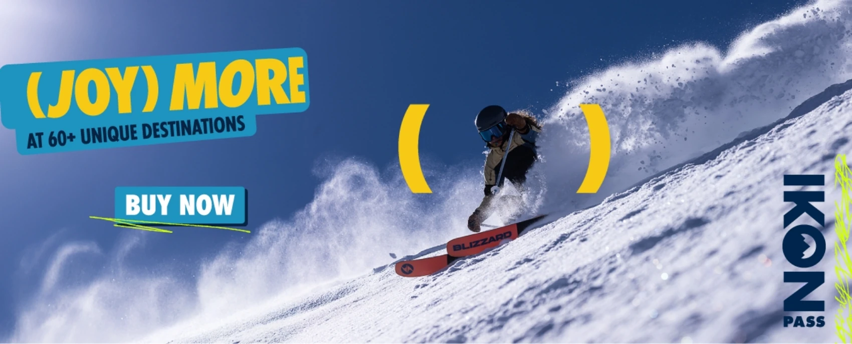Skier carving through powder under a clear blue sky promoting the Ikon Pass, offering access to 60+ world-class ski destinations
