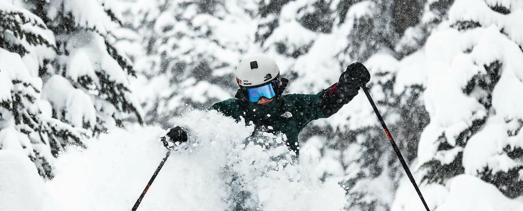 Customer picking up rental ski boots at a ski shop counter